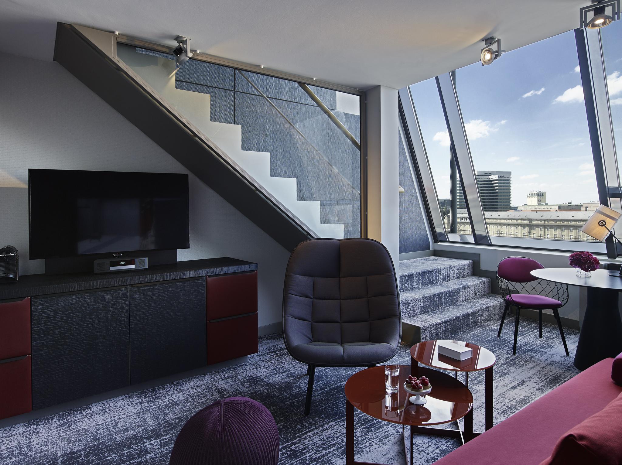 Sofitel Munich Bayerpost Hotel Exterior photo The living room of a suite at the hotel